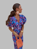 Women's dress with pleated sleeves and defined waist