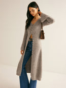 Women's sweater dress with side slit and long sleeves