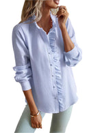 Women's blouse with ruffle accents and clean button front