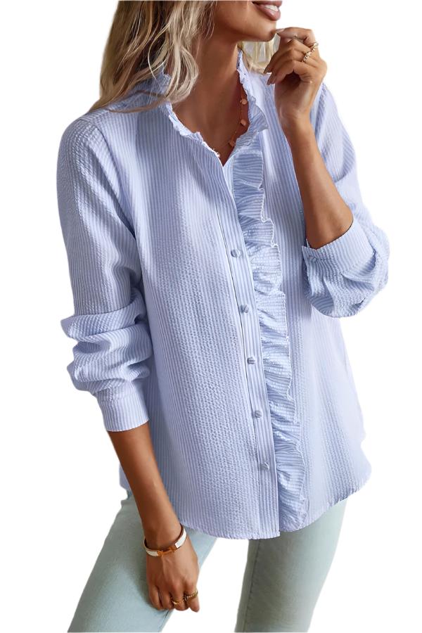 Women's blouse with ruffle accents and clean button front