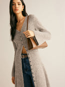 Women's sweater dress with side slit and long sleeves