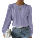 Women's blouse with puff sleeves and structured detailing