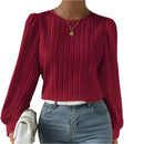 Women's blouse with puff sleeves and structured detailing