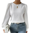 Women's blouse with puff sleeves and structured detailing