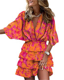 Women’s dress with batwing sleeves and v-neckline