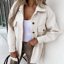 Women's long jacket with wide lapel and single-breasted front