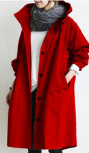 Women’s trench coat with structured cut and functional design