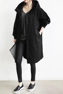Women’s trench coat with structured cut and functional design