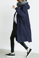 Women’s trench coat with structured cut and functional design