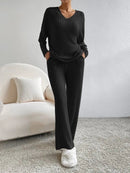 Women’s two-piece sweater set with v-neck top and wide-leg pants