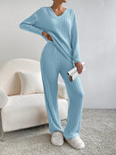 Women’s two-piece sweater set with v-neck top and wide-leg pants