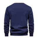 Men's long-sleeve polo with contrast collar and structured shape
