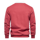 Men's long-sleeve polo with contrast collar and structured shape