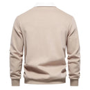 Men's long-sleeve polo with contrast collar and structured shape