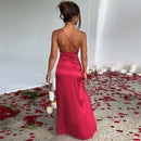 Women’s maxi dress with one-shoulder cut and flowing silhouette