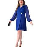 Women’s dress with sheer sleeves and defined silhouette