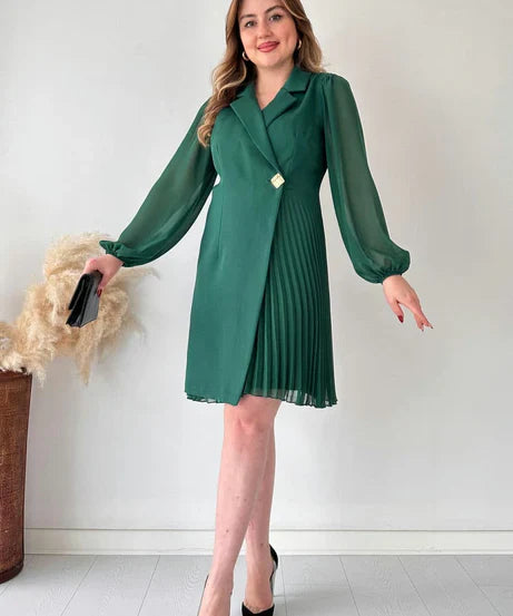 Women’s dress with sheer sleeves and defined silhouette